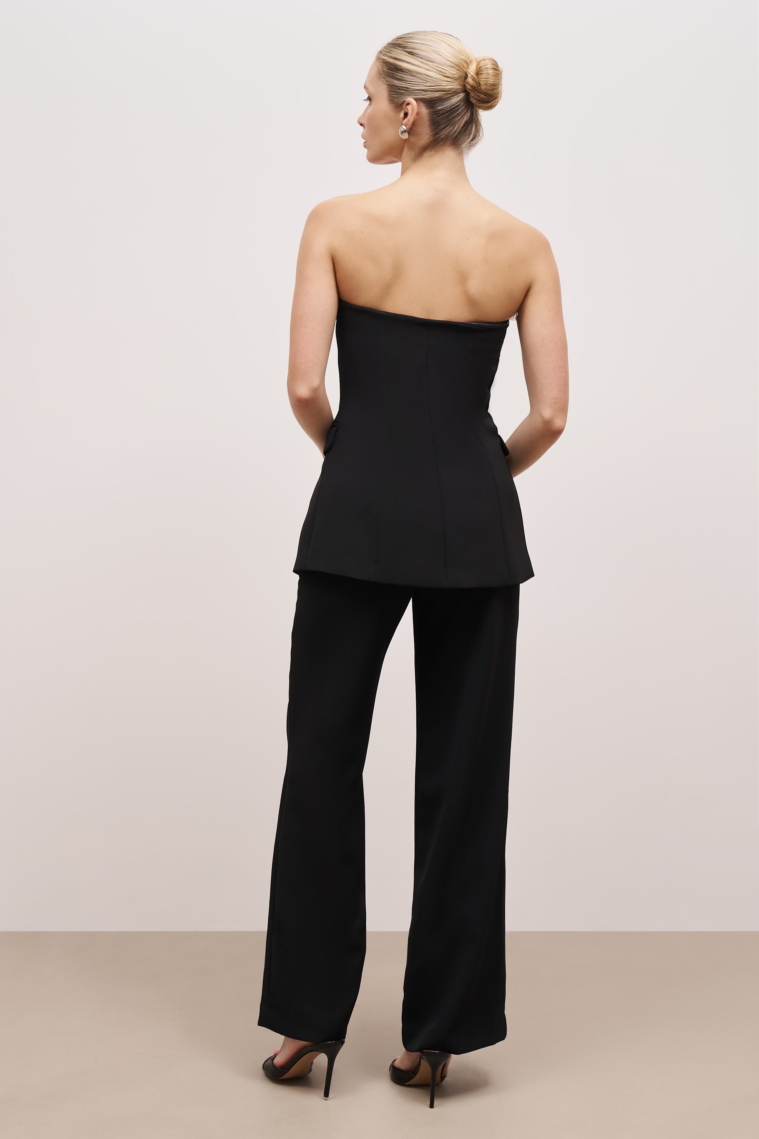 black strapless peplum top